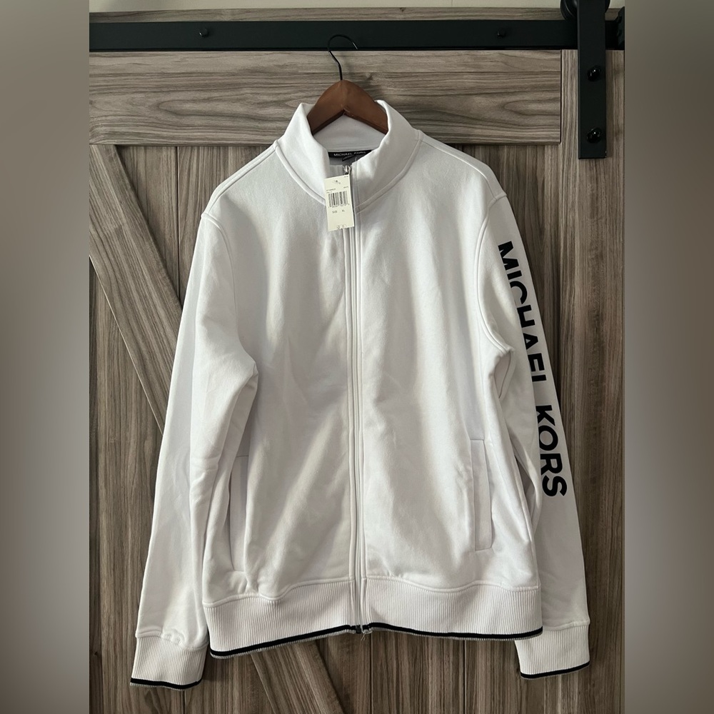 MK. Men’s light jacket. With tag attached, never worn.